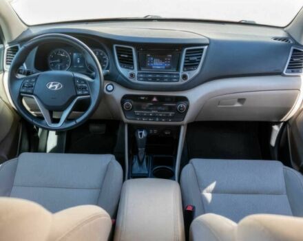 Червоний Хендай Туксон, об'ємом двигуна 1.6 л та пробігом 54 тис. км за 10300 $, фото 9 на Automoto.ua