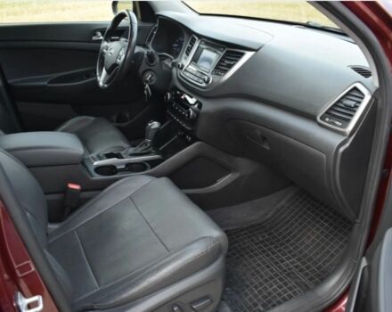 Красный Хендай Туксон, объемом двигателя 2 л и пробегом 34 тыс. км за 10000 $, фото 6 на Automoto.ua