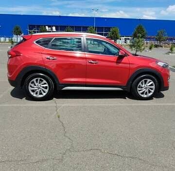 Червоний Хендай Туксон, об'ємом двигуна 2 л та пробігом 72 тис. км за 21500 $, фото 1 на Automoto.ua