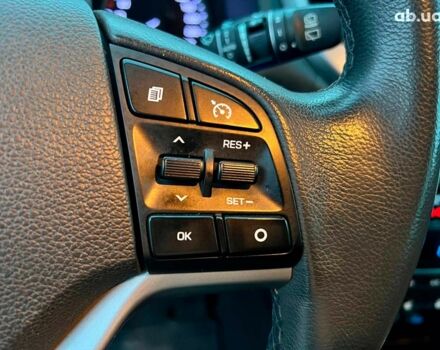 Червоний Хендай Туксон, об'ємом двигуна 2 л та пробігом 136 тис. км за 18690 $, фото 23 на Automoto.ua