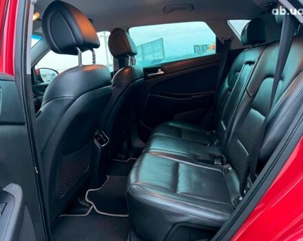 Червоний Хендай Туксон, об'ємом двигуна 2 л та пробігом 136 тис. км за 18690 $, фото 34 на Automoto.ua