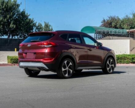 Червоний Хендай Туксон, об'ємом двигуна 1.6 л та пробігом 54 тис. км за 10300 $, фото 7 на Automoto.ua