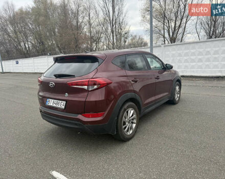 Червоний Хендай Туксон, об'ємом двигуна 2 л та пробігом 93 тис. км за 16500 $, фото 3 на Automoto.ua