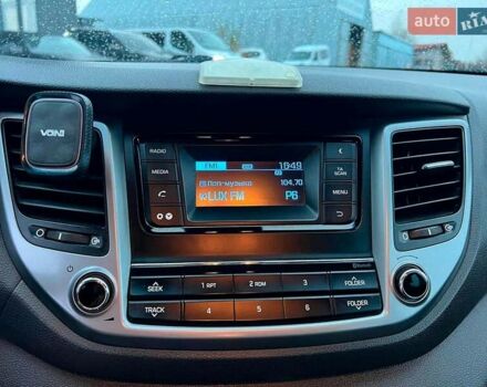 Червоний Хендай Туксон, об'ємом двигуна 2 л та пробігом 136 тис. км за 18690 $, фото 29 на Automoto.ua