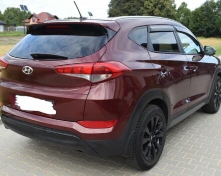 Червоний Хендай Туксон, об'ємом двигуна 2 л та пробігом 117 тис. км за 10300 $, фото 3 на Automoto.ua