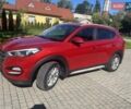 Красный Хендай Туксон, объемом двигателя 2 л и пробегом 134 тыс. км за 19500 $, фото 1 на Automoto.ua