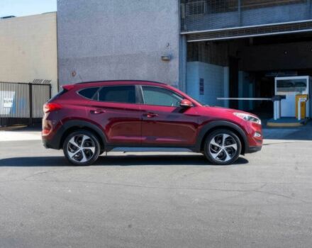 Червоний Хендай Туксон, об'ємом двигуна 1.6 л та пробігом 54 тис. км за 10300 $, фото 3 на Automoto.ua