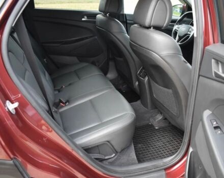 Червоний Хендай Туксон, об'ємом двигуна 2 л та пробігом 117 тис. км за 10300 $, фото 7 на Automoto.ua