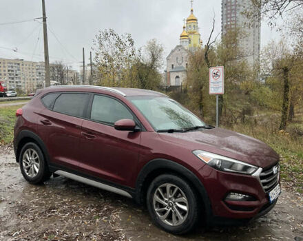 Червоний Хендай Туксон, об'ємом двигуна 2 л та пробігом 150 тис. км за 13300 $, фото 6 на Automoto.ua