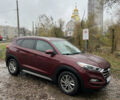 Червоний Хендай Туксон, об'ємом двигуна 2 л та пробігом 150 тис. км за 13300 $, фото 6 на Automoto.ua