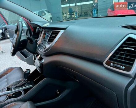 Червоний Хендай Туксон, об'ємом двигуна 2 л та пробігом 136 тис. км за 18690 $, фото 41 на Automoto.ua