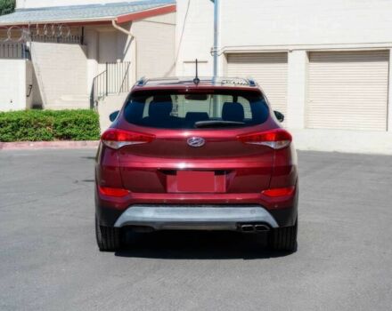 Червоний Хендай Туксон, об'ємом двигуна 1.6 л та пробігом 54 тис. км за 10300 $, фото 6 на Automoto.ua