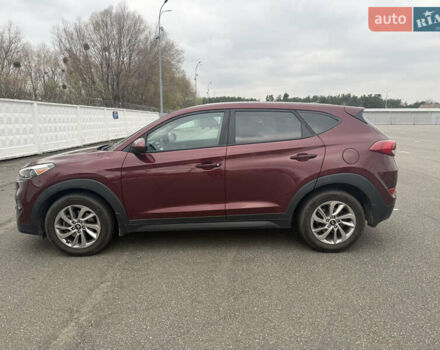 Червоний Хендай Туксон, об'ємом двигуна 2 л та пробігом 93 тис. км за 16500 $, фото 5 на Automoto.ua