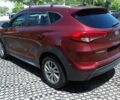 Красный Хендай Туксон, объемом двигателя 2 л и пробегом 72 тыс. км за 5500 $, фото 3 на Automoto.ua