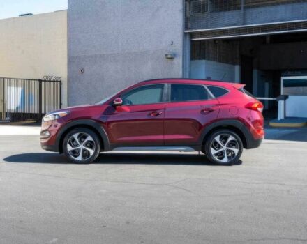 Червоний Хендай Туксон, об'ємом двигуна 1.6 л та пробігом 54 тис. км за 10300 $, фото 4 на Automoto.ua