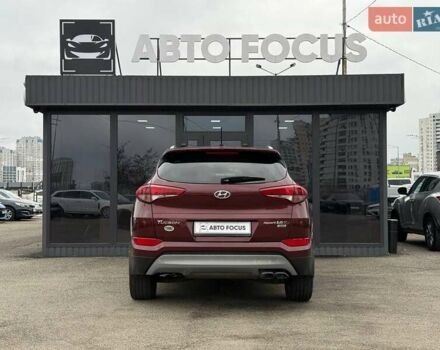 Червоний Хендай Туксон, об'ємом двигуна 1.59 л та пробігом 117 тис. км за 15890 $, фото 5 на Automoto.ua