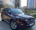 Красный Хендай Туксон, объемом двигателя 2 л и пробегом 117 тыс. км за 17850 $, фото 1 на Automoto.ua