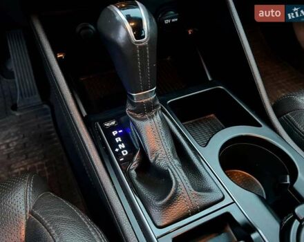 Червоний Хендай Туксон, об'ємом двигуна 2 л та пробігом 136 тис. км за 18690 $, фото 32 на Automoto.ua