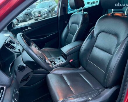 Червоний Хендай Туксон, об'ємом двигуна 2 л та пробігом 136 тис. км за 18690 $, фото 17 на Automoto.ua