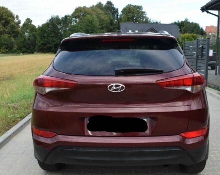 Красный Хендай Туксон, объемом двигателя 2 л и пробегом 34 тыс. км за 10000 $, фото 4 на Automoto.ua