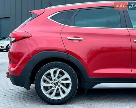 Червоний Хендай Туксон, об'ємом двигуна 2 л та пробігом 136 тис. км за 18690 $, фото 9 на Automoto.ua