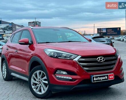 Червоний Хендай Туксон, об'ємом двигуна 2 л та пробігом 136 тис. км за 18690 $, фото 12 на Automoto.ua