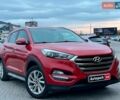Червоний Хендай Туксон, об'ємом двигуна 2 л та пробігом 136 тис. км за 18690 $, фото 12 на Automoto.ua