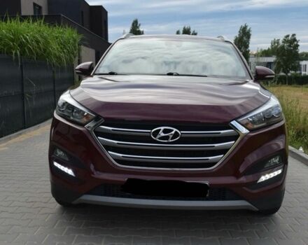 Красный Хендай Туксон, объемом двигателя 2 л и пробегом 34 тыс. км за 10000 $, фото 1 на Automoto.ua