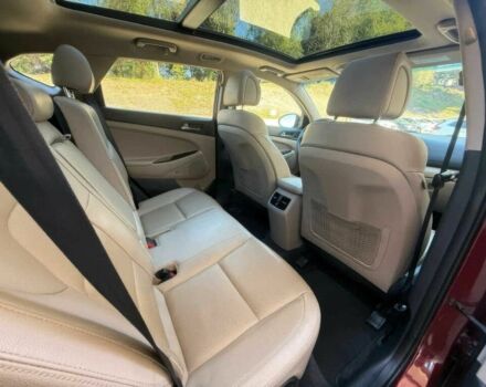 Красный Хендай Туксон, объемом двигателя 1.6 л и пробегом 39 тыс. км за 4800 $, фото 13 на Automoto.ua