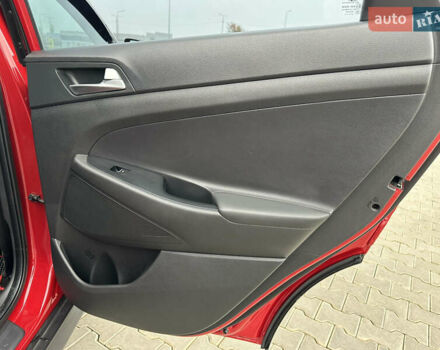 Красный Хендай Туксон, объемом двигателя 2 л и пробегом 91 тыс. км за 18800 $, фото 37 на Automoto.ua