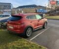 Красный Хендай Туксон, объемом двигателя 2 л и пробегом 157 тыс. км за 20000 $, фото 3 на Automoto.ua