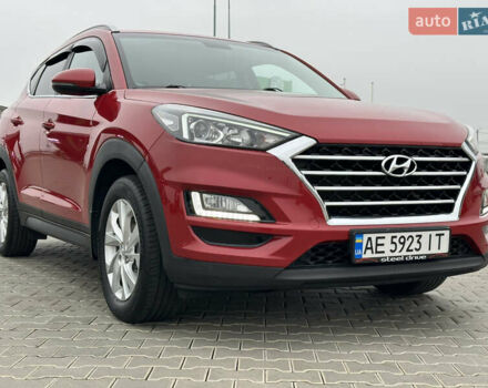 Красный Хендай Туксон, объемом двигателя 2 л и пробегом 91 тыс. км за 18800 $, фото 11 на Automoto.ua