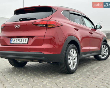 Красный Хендай Туксон, объемом двигателя 2 л и пробегом 91 тыс. км за 18800 $, фото 15 на Automoto.ua