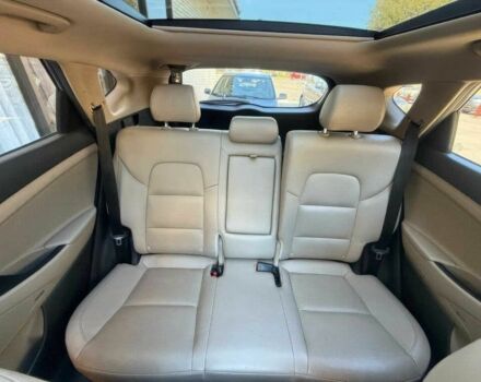 Красный Хендай Туксон, объемом двигателя 1.6 л и пробегом 39 тыс. км за 4800 $, фото 11 на Automoto.ua