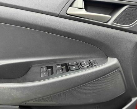 Червоний Хендай Туксон, об'ємом двигуна 2 л та пробігом 149 тис. км за 13800 $, фото 13 на Automoto.ua