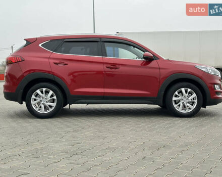 Красный Хендай Туксон, объемом двигателя 2 л и пробегом 91 тыс. км за 18800 $, фото 10 на Automoto.ua