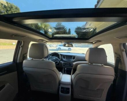 Червоний Хендай Туксон, об'ємом двигуна 1.6 л та пробігом 44 тис. км за 16000 $, фото 7 на Automoto.ua