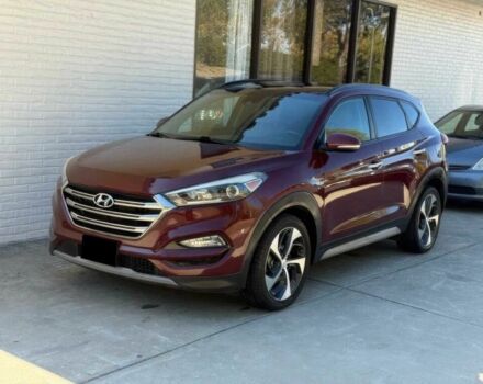 Красный Хендай Туксон, объемом двигателя 1.6 л и пробегом 39 тыс. км за 4800 $, фото 2 на Automoto.ua
