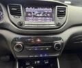 Червоний Хендай Туксон, об'ємом двигуна 2 л та пробігом 149 тис. км за 13800 $, фото 12 на Automoto.ua