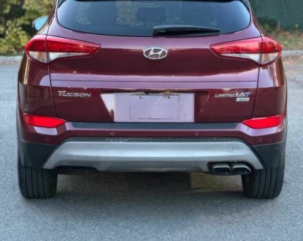 Красный Хендай Туксон, объемом двигателя 1.6 л и пробегом 37 тыс. км за 11550 $, фото 5 на Automoto.ua