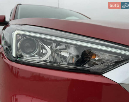 Красный Хендай Туксон, объемом двигателя 2 л и пробегом 91 тыс. км за 18800 $, фото 19 на Automoto.ua