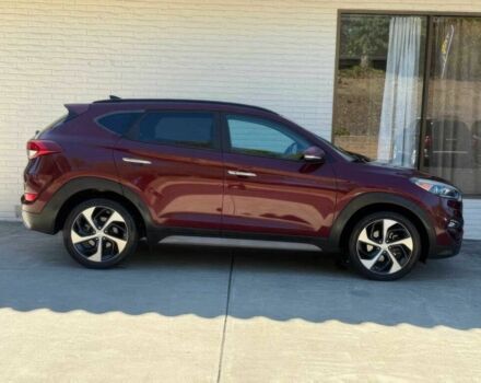 Червоний Хендай Туксон, об'ємом двигуна 1.6 л та пробігом 44 тис. км за 16000 $, фото 4 на Automoto.ua