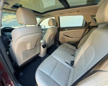 Красный Хендай Туксон, объемом двигателя 1.6 л и пробегом 39 тыс. км за 4800 $, фото 15 на Automoto.ua