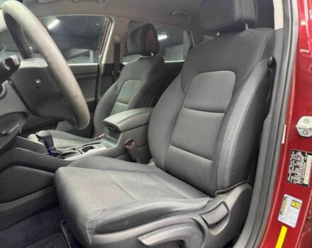 Червоний Хендай Туксон, об'ємом двигуна 2 л та пробігом 149 тис. км за 13800 $, фото 6 на Automoto.ua