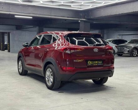 Червоний Хендай Туксон, об'ємом двигуна 2 л та пробігом 149 тис. км за 13800 $, фото 3 на Automoto.ua