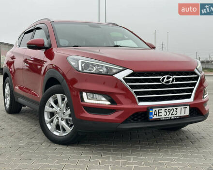 Красный Хендай Туксон, объемом двигателя 2 л и пробегом 91 тыс. км за 18800 $, фото 17 на Automoto.ua