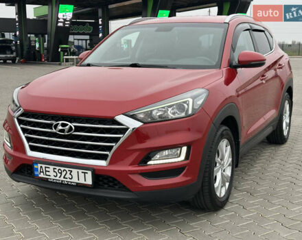 Красный Хендай Туксон, объемом двигателя 2 л и пробегом 91 тыс. км за 18800 $, фото 1 на Automoto.ua