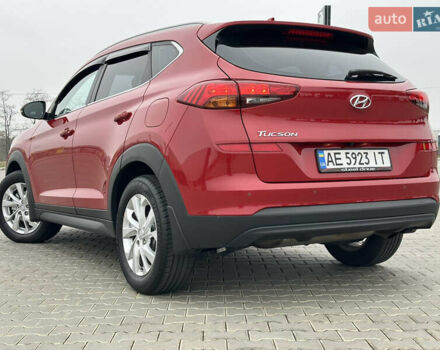 Красный Хендай Туксон, объемом двигателя 2 л и пробегом 91 тыс. км за 18800 $, фото 16 на Automoto.ua