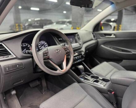 Червоний Хендай Туксон, об'ємом двигуна 2 л та пробігом 149 тис. км за 13800 $, фото 7 на Automoto.ua