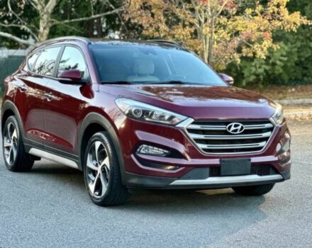 Красный Хендай Туксон, объемом двигателя 1.6 л и пробегом 37 тыс. км за 11550 $, фото 2 на Automoto.ua
